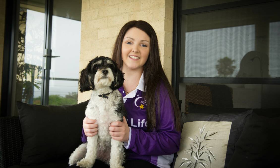 Proud Relay for Life participant Ashleigh Collins died in the early hours of Saturday. Pictured with her dog Lulu  Picture: ALBEY BOND
