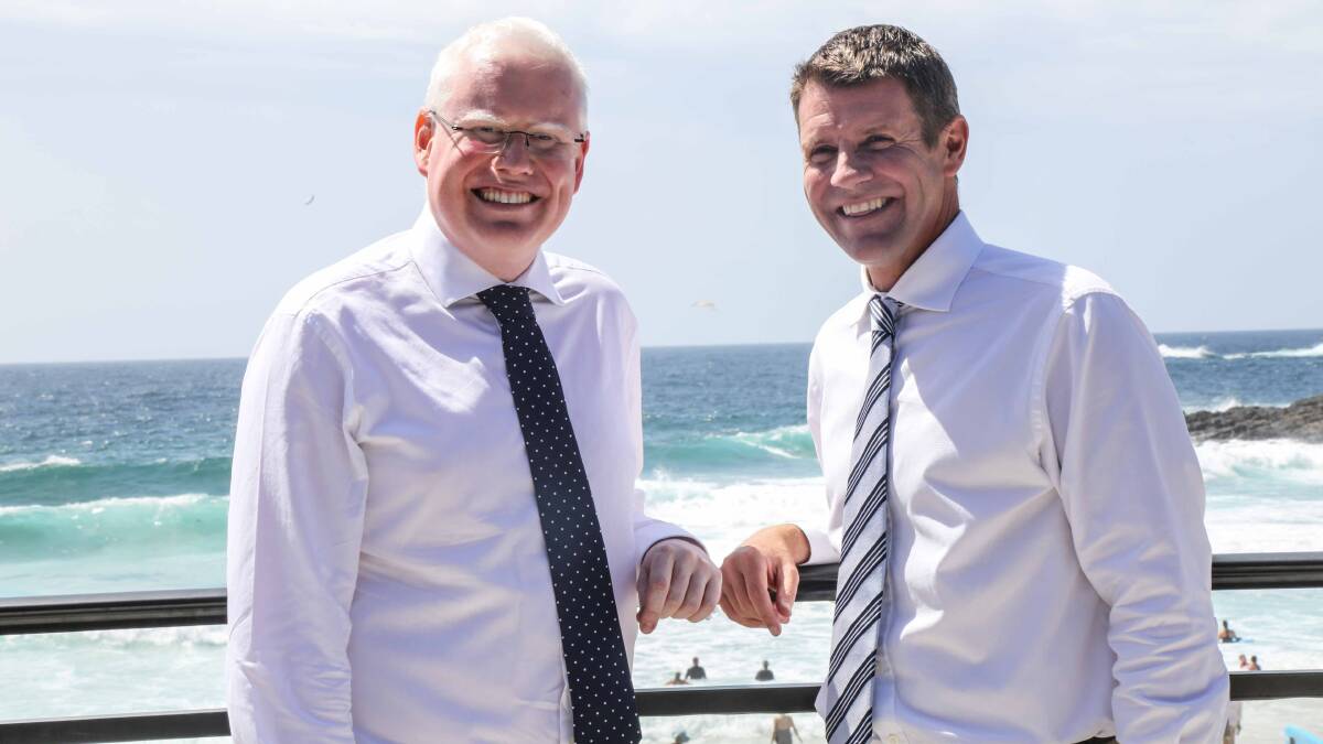 "Relentless" Kiama MP Gareth Ward and Premier Micke Baird after announcing a grant which will enable disabled access to Kiama Surf Club 