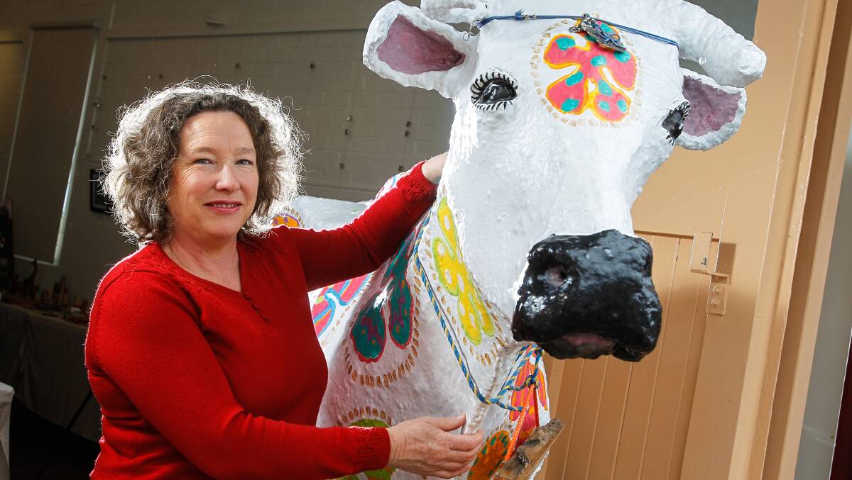 Kiama Council's director of community services Claire Rogers with Daisy the cow. Picture: CHRISTOPHER CHAN