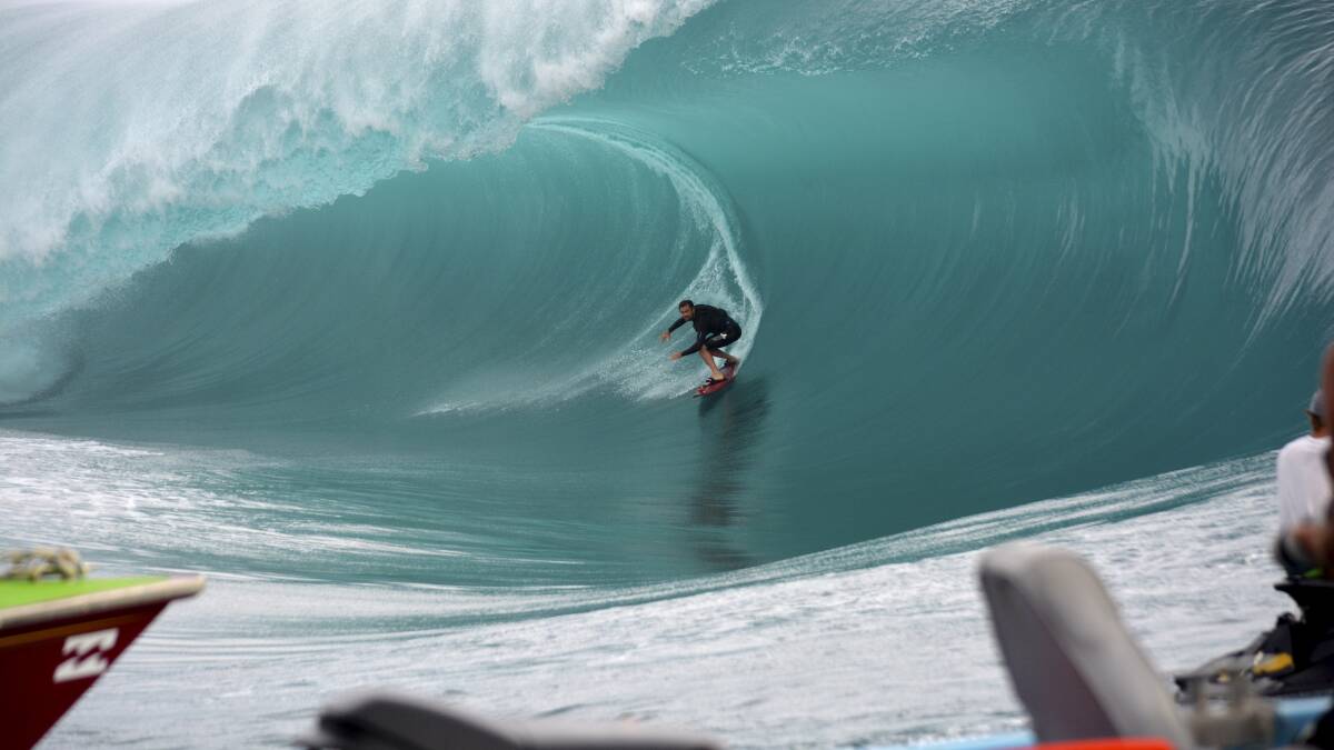 Dylan Longbottom rides the wave of success while filming a scene for Point Break in Tahiti. 