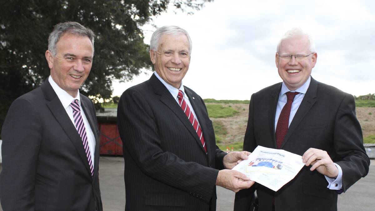 Kiama Municipal Council General Manager Michael Forsyth, Mayor Brian Petschler and Member for Kiama, Gareth Ward with the plans for the new recycling centre at Minnamurra. Picture: DAVID HALL 