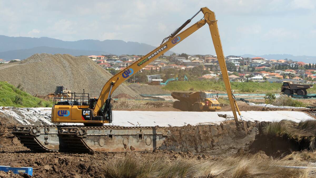 The amphibious excavator in action. Picture: GREG TOTMAN