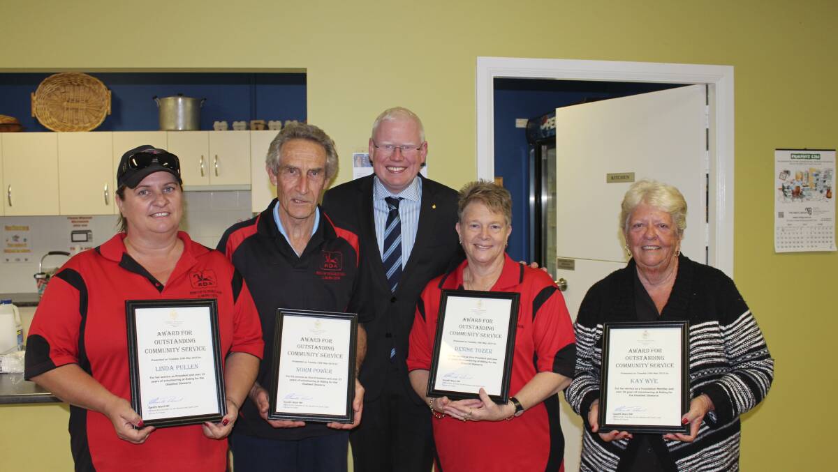 Gareth Ward MP for Kiama presenting Outstanding Community Service Awards to recipients from Illawarra Riding for the Disabled including Linda Pullen (president), Denise Tozer (vice-president), Norm Power (vice-president) and Kay Wye (foundation member