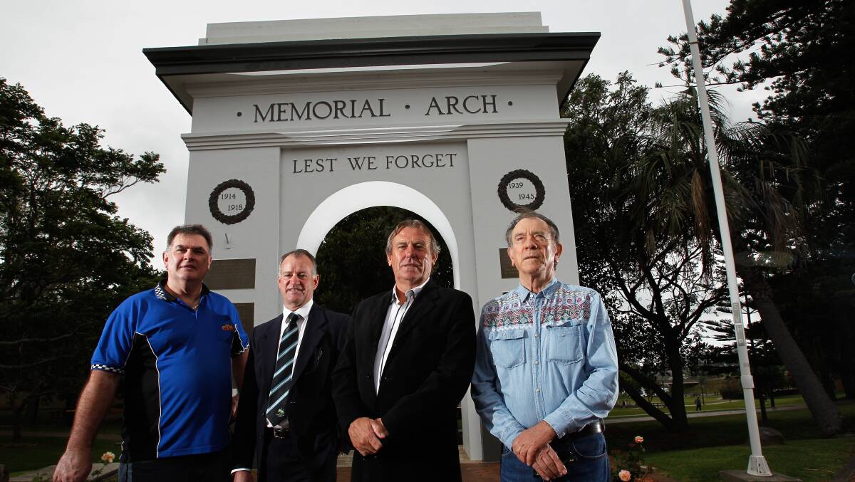 Gavin McClure, Bryan Whittaker, Dennis Seage and Ian Pullar at the leaning Kiama Arch, now funded for stabilisation after Anzac Day.  Picture: CHRISTOPHER CHAN 