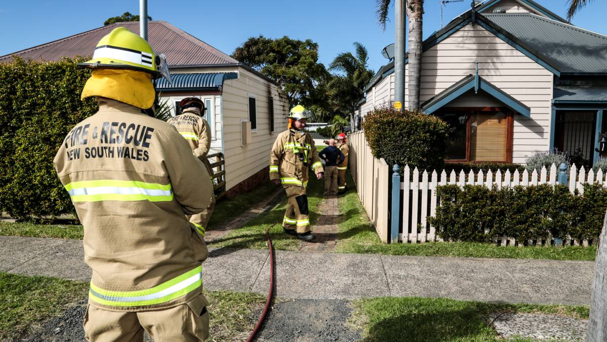 Shellharbour and Warrawong fire crews extinguished a house fire in Shellharbour this morning. Picture: GEORGIA MATTS