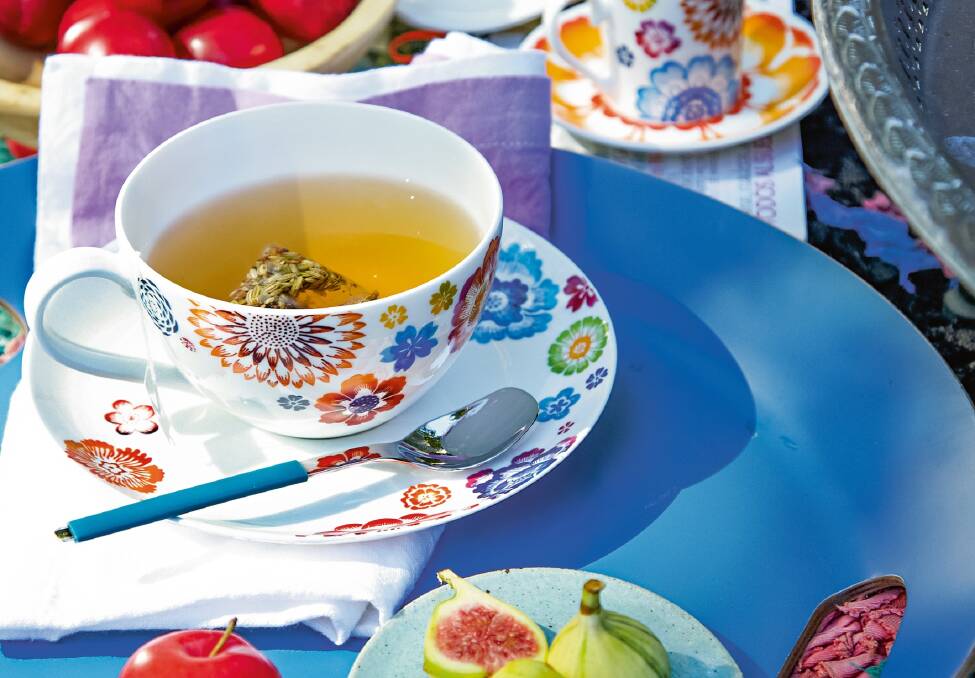 Colourful crockery keeps the occasion light and relaxed.