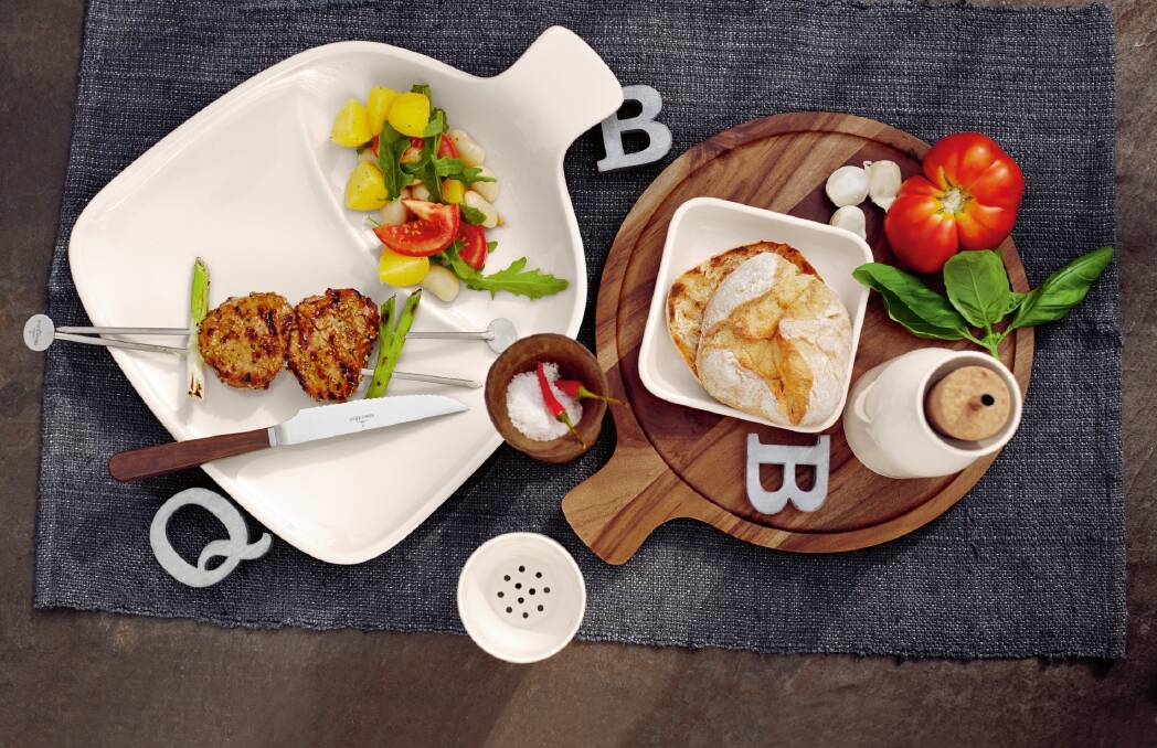 Mix porcelain and timber platters for a relaxed, rustic look.