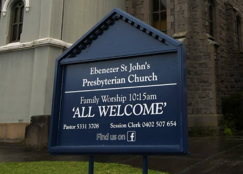 A sign out the front of the church that reads "all welcome".