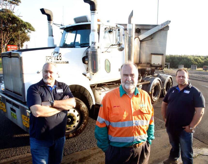 DRIVING FORCE: Truck driver Pat Armstrong (centre) with Lee Lawler and Rob Pirc from the Transport Workers Union. Picture: Sylvia Liber
