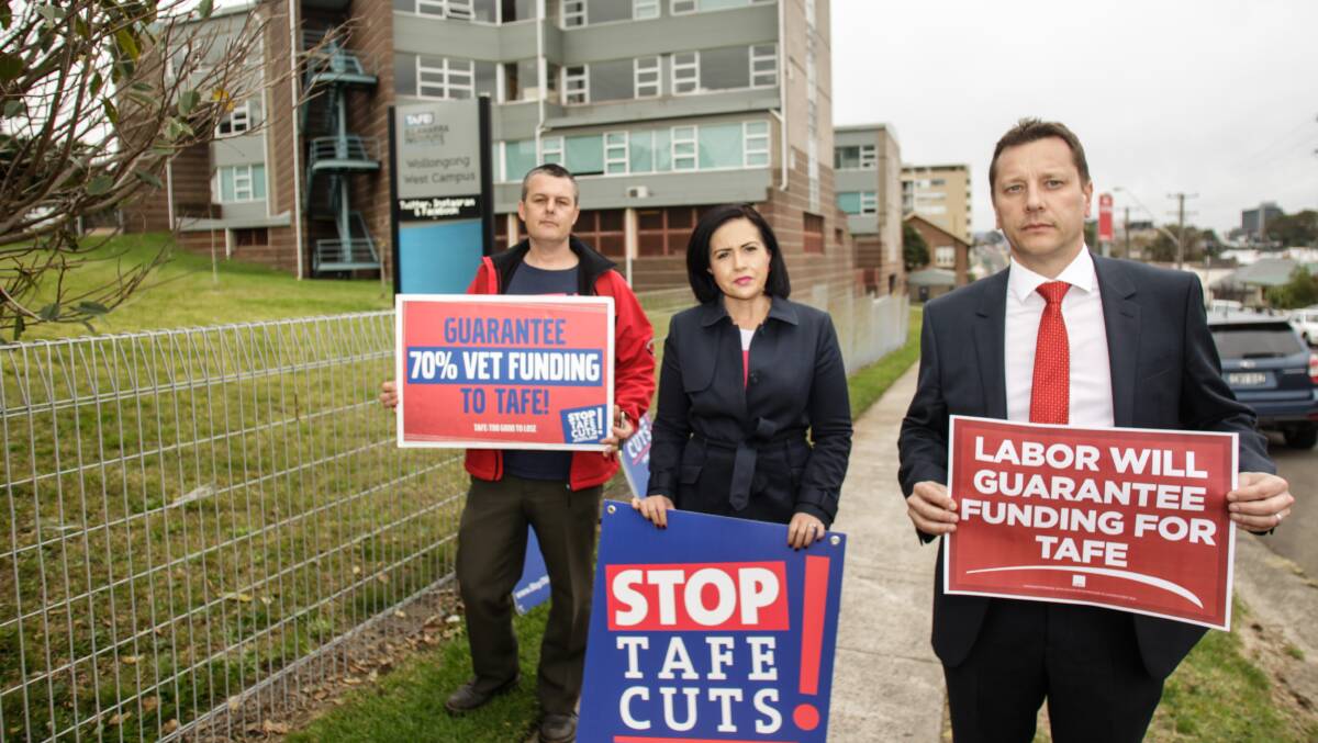 Labor's Wollongong candidate Paul Scully (right) mounts his TAFE battle with Labor's skills spokeswoman Prue Car and union rep Adam Curlis. Picture: Georgia Matts