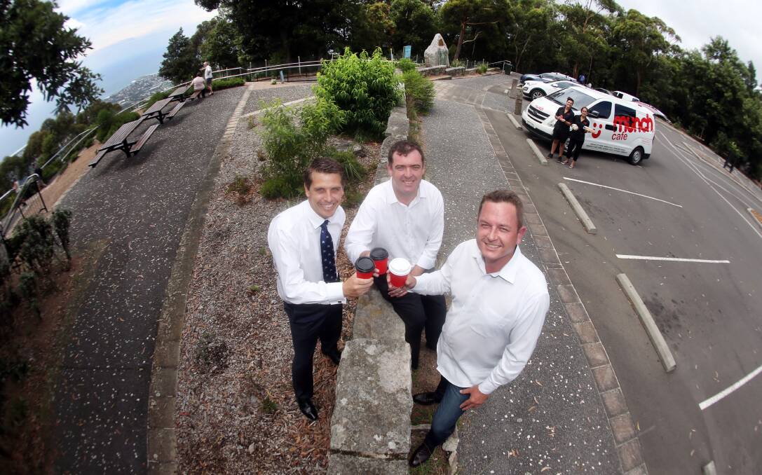 CUPPA: Keira MP Ryan Park, Destination Wollongong's Mark Sleigh and Greg Fitzgerald from Munch Express on Mount Keira. Picture: Robert Peet