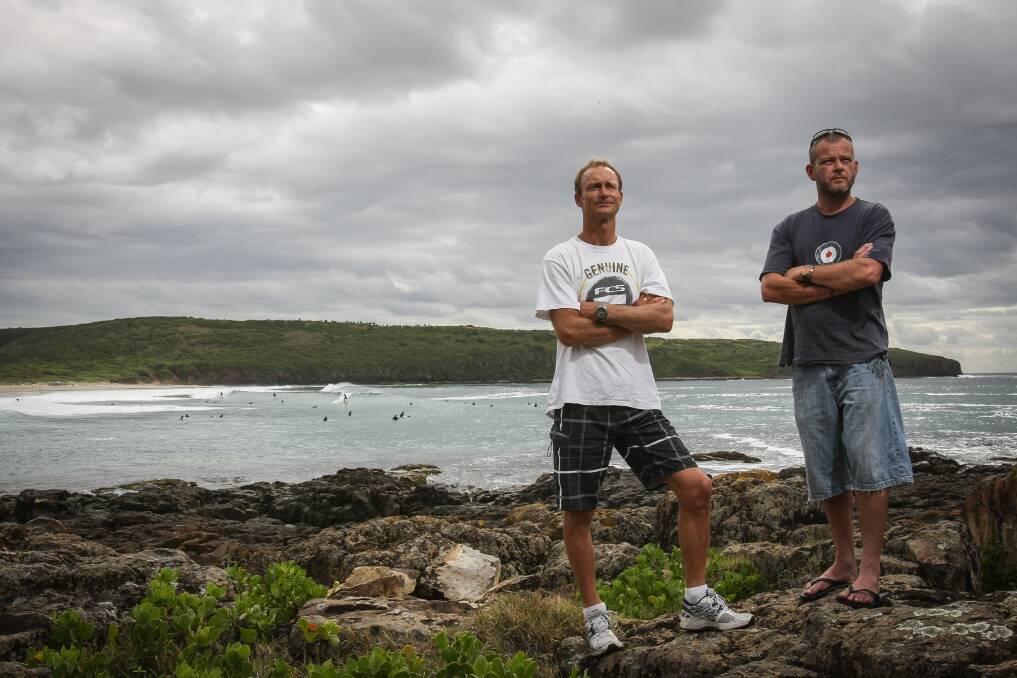 Killalea State Park Trust deputy chairman Chris Homer (left), pictured with fellow surfer Craig Ryall, wants to raise awareness of the dangerous conditions at The Farm. Picture: DYLAN ROBINSON