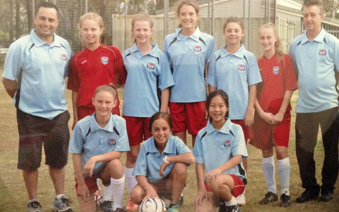 NSW Country under-13s national futsal champions (back row) Andrew McKenzie (manager), Lani Johnson, Talia Westley, Kiara Rochaix, Meredith Cheyne, Mariah Peever, Mark Peever (coach), front row Eliza Cowan, Teisha McKenzie and Santina Wang. The team managed a 13-0 win over Queensland City in the final.