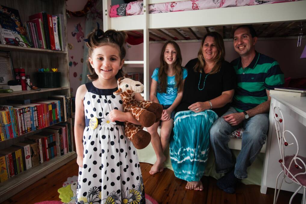 Ruby Marriott (left) was diagnosed with leukaemia two years ago and was supported by the Starlight Children's Foundation. Pictured with sister Gabrielle, mum Cindy and dad Steve. Picture: DYLAN ROBINSON