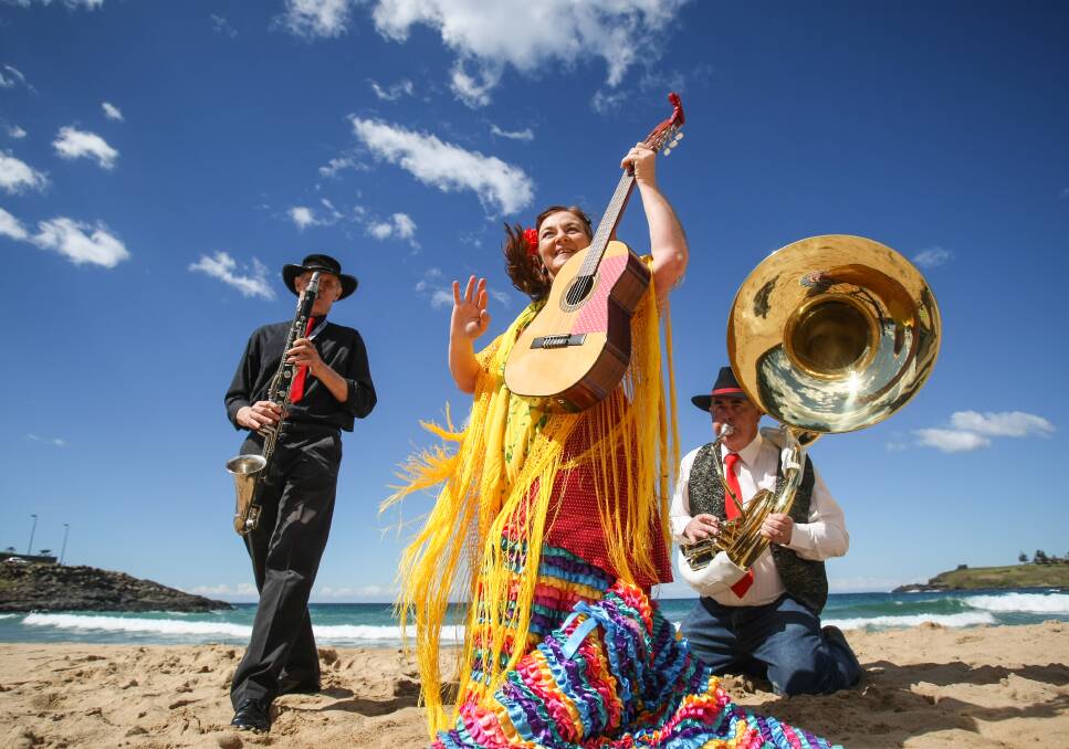 Greg Knight, April Samson-Kelly and Bill Short help launch the inaugural Folk by the Sea at Surf Beach. Picture: DYLAN ROBINSON