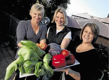 Local Feast owners Deborah Jermyn and Jessica Taylor are organising a fresh food market with Jamberoo Pub's Erica Warren to be held at the pub. Photo Dylan Robinson