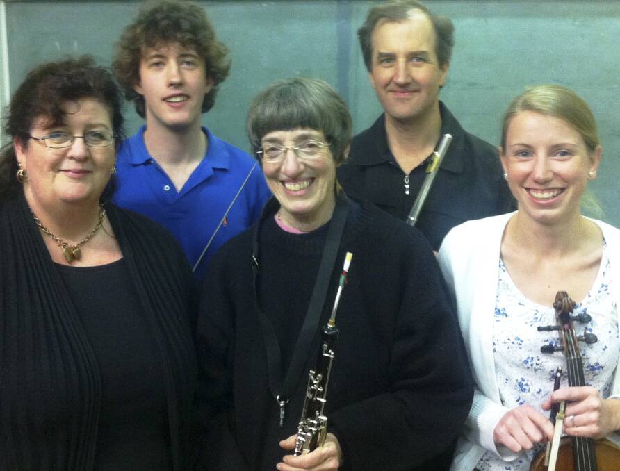 South Coast Orchestra's soloists gather for rehearsal. From left. Pamela Harris (piano), Christopher Higgins (conductor), Lori Lebow (English horn), Ian Butler (flute) and Emily Kastelein (leader and violin).