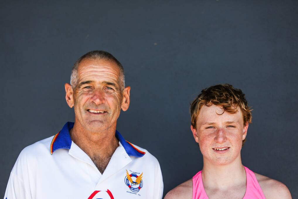 Future in good hands - one of the older competitors at last weekend's South Coast Branch surf titles, Shellharbour's Darryl Glover, 66, with one of the youngest, Kiama's Liam Flanaghan, 14. Picture: DYLAN ROBINSON