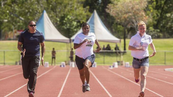 ALP Senate Candidate for the NT and Julia Gillard's "Captains Pick" Nova Peris participates in a celebrity 100-metre dash at the NT Little Athletics Championships. Photo: Glenn Campbell