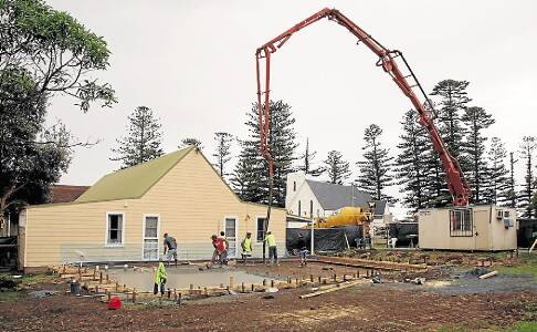 Work gets under way on the Kiama Anglican Church's Youth Shed, which should be open for Christmas.