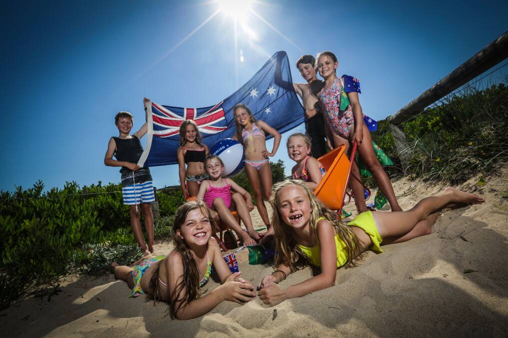 Kiama Downs Surf Life Saving Club youngsters Jesse Brooks (back left), Gabi Deen, Ella Clark, Ethan Clark, Lily Clark, Charlie Brooks (centre), Macey Guy, Zoe Brooks (front left) and Zali Guy get in the spirit for Australia Day. Picture: DYLAN ROBINSON