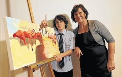 Gerringong's Connor Bland, 13, with art teacher Wanda Grein and his art work in progress that will go on display for an exhibition at the old Kiama Fire Station. 23/08/2012 Photo Dylan Robinson