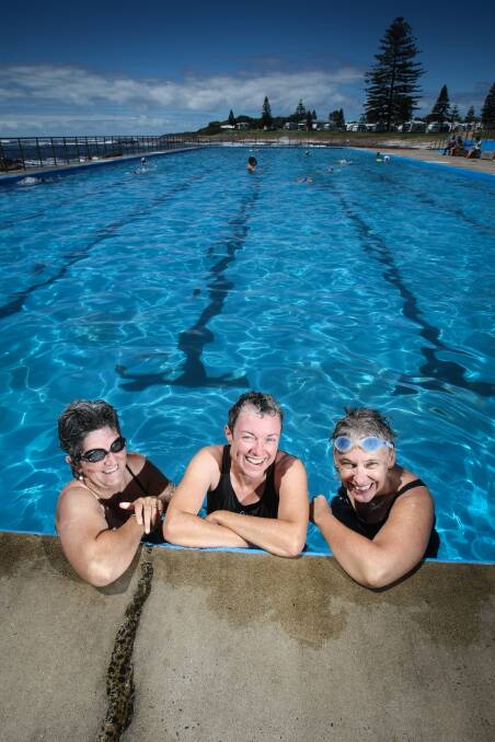 Ann Paul, Narelle Crux and Lucy Healey, from Victoria, form a group known as the Salty Seabathers. They were at Beverley Whitfield Pool at Shellharbour Village last Thursday. Picture: DYLAN ROBINSON