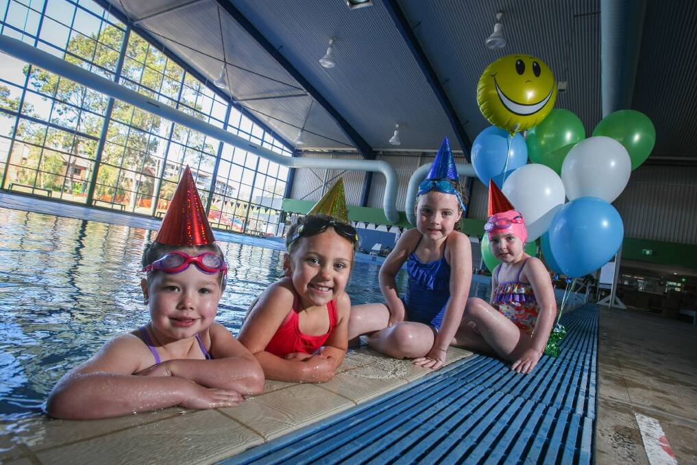 Jade Wright, Ruby Walker, Jade Miller and Bree Miller prepare for Saturday's leisure centre reopening party. Picture: DYLAN ROBINSON