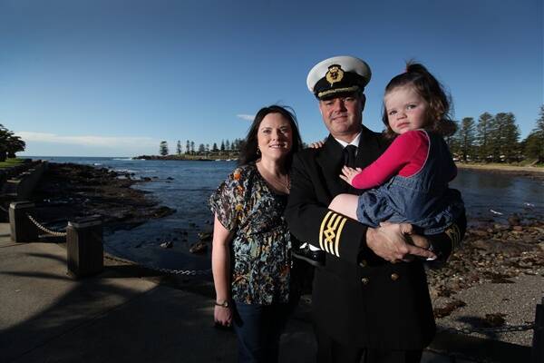 Jason Britton with his wife Amanda and daughter Jessica after returning with the Navy's latest acquisition the ADV Ocean Shield.
