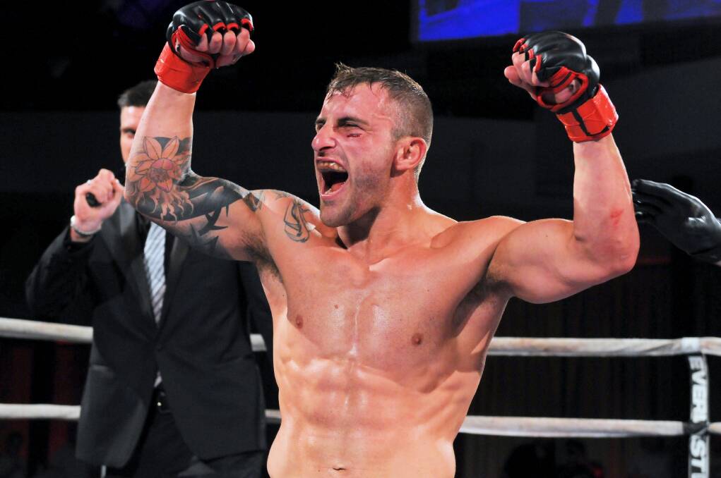 Shellharbour’s Alex Volkanovski celebrates his eighth MMA fight from nine outings during the Australia Cup in Melbourne.