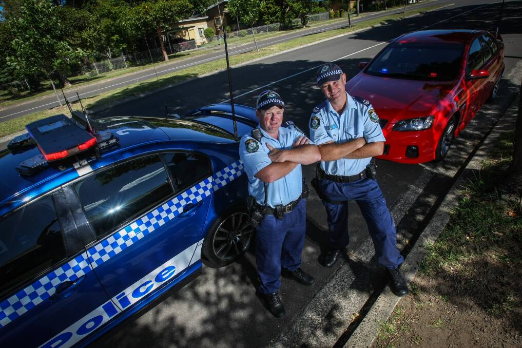 Helping to keep the roads safe this holiday season will be Lake Illawarra highway patrol officer Senior Constable Graham Walker and Senior Constable Damien Bush. Picture: DYLAN ROBINSON