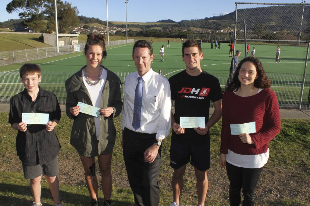 Cheques all round: Member for Throsby Stephen Jones with Local Sporting Champion Grants recipients Kory Griffiths, Jessica Rosskelly, Blake Govers and Alexis Mastrodomenico last week. Picture: DAVID HALL