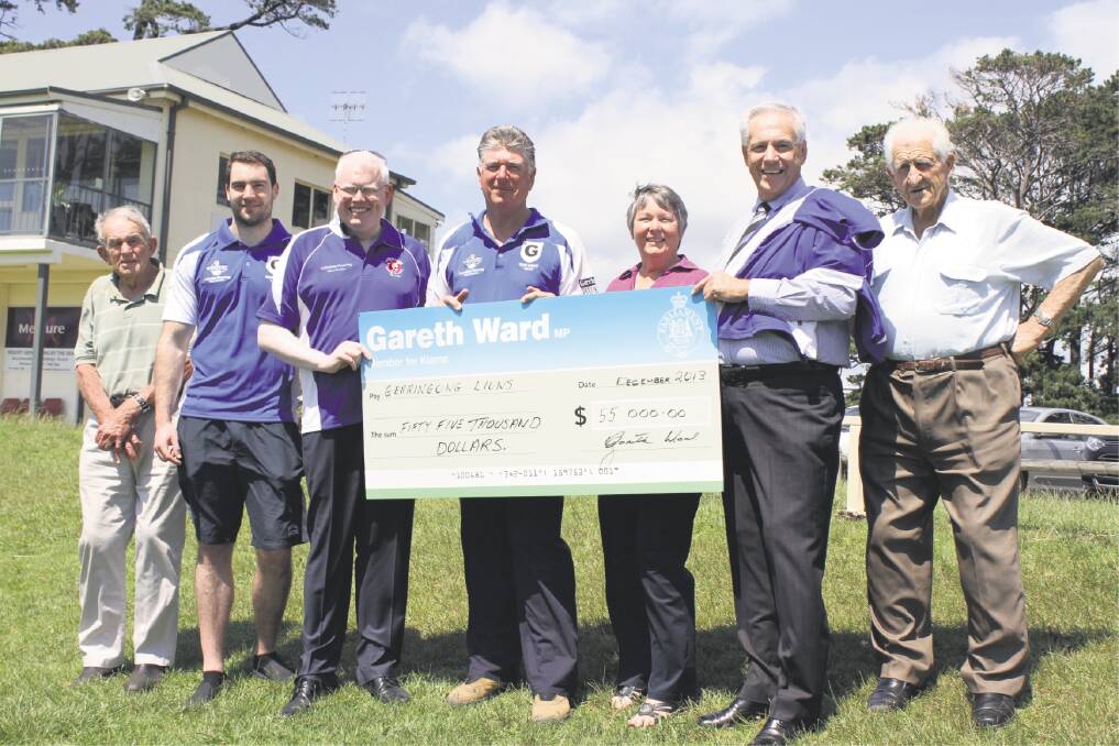 Member for Kiama Gareth Ward (third from left) and Kiama Mayor Brian Petschler (second from right) joined by Gerringong Lions life member Don Sharpe, player Peter Cronin, president Daryll Hobbs, secretary Jan Brett and life member Geoff O'Sullivan at the site of the new building to be started soon. Picture: DAVID HALL