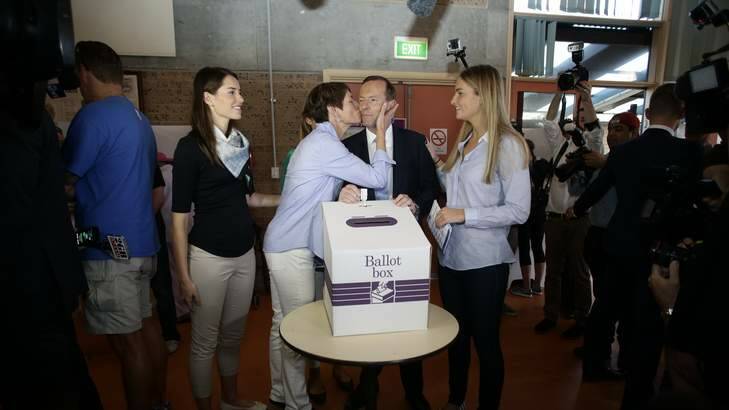 Opposition Leader Tony Abbott casts his vote at Freshwater Surf Life Saving Club in his electorate. Photo: Alex Ellinghausen