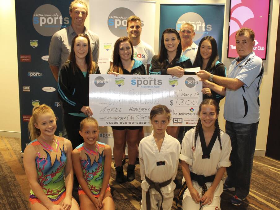 Glen Saville, Beau Ryan, David Boyle and Kevin Docherty, who will all be involved with the upcoming Shellharbour Sports Star presentation on March 15, with members of the Oak Flats/Albion Park Gymnastics and Acrobatics Club (centre), and All That Jazz Dance Co and KD's Taekwondo at South Coast Martial Arts Centre at The Shellharbour Club last week. Picture: DAVID HALL