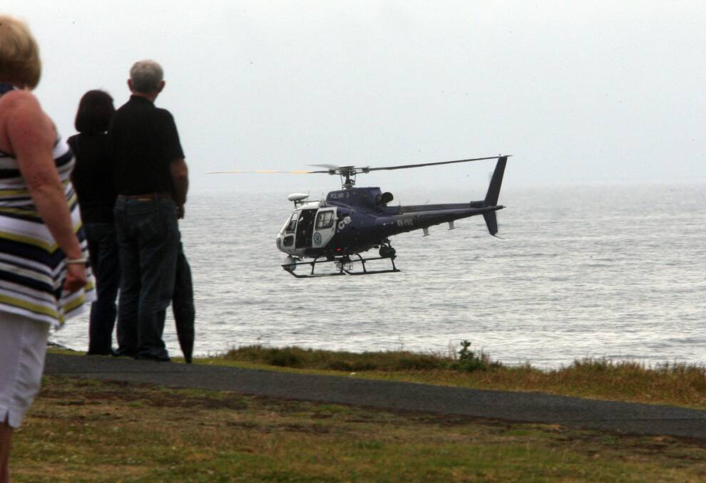 A helicopter searches for a fisherman in 2012, an all too common occurrence.