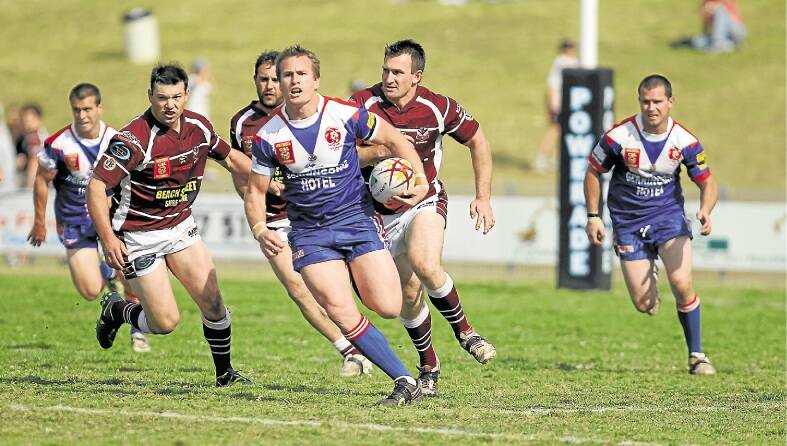 Gerringong fullback Joel Roberts splits the Albion Park-Oak Flats defence during his strong display during Sunday?s 16-14 grand final loss at Centenary Field. Picture: KIAMA PICTURE CO