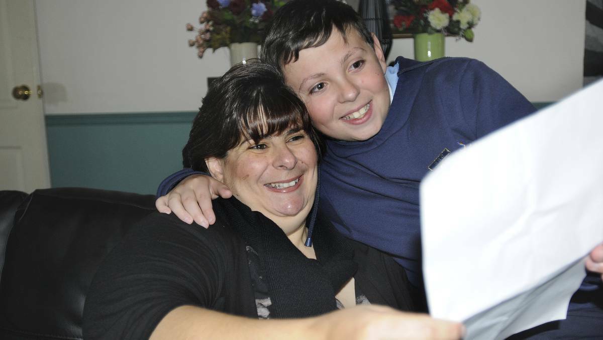  Bathurst boy John Attard, and his mum Francesca, with the letter notifying them that John has been selected as a finalist in the National Youth Awards. Picture: Chris Seabrook