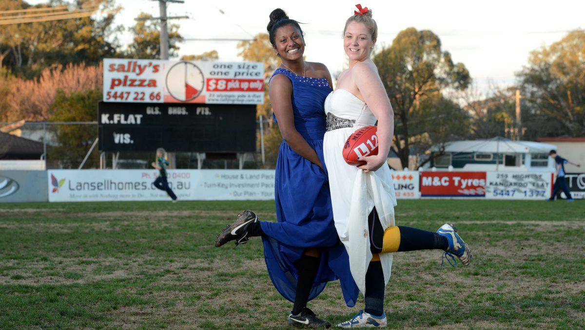 Bendigo Thunder footballers Melina Tatti, left, and Lily Campbell will give their team jumpers the boot for Friday night’s inaugural Thunder club ball. Picture: Jim Aldersey