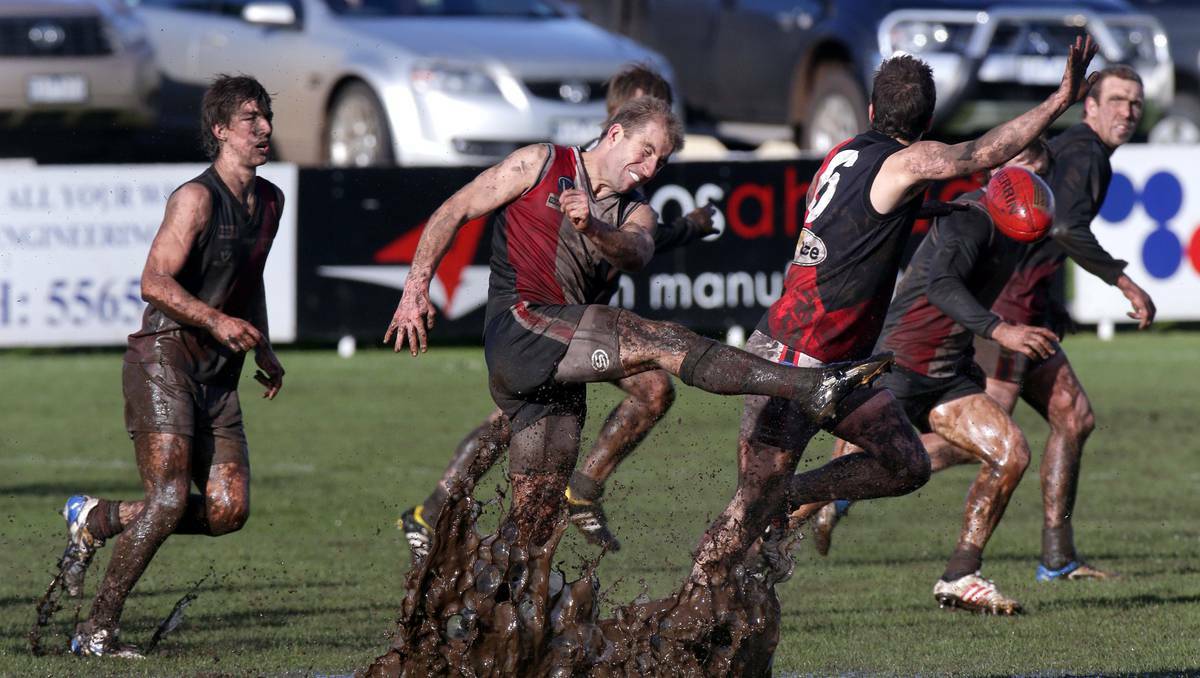 Sunday's struggle in the mud in the Hampden Football League in Victoria's south west, Cobden versus Koroit.