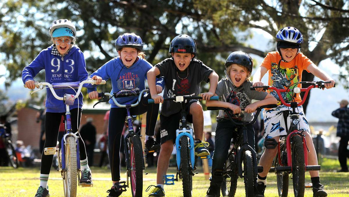 Jocelyn Heywood, 9, Katie Nener, 9, Sayden Jones, 9, Bailey Moss, 9, and William Lake, 10, all of Manilla, say ‘Bring it on!’ at the start of Sunday’s inaugural bicycle gymkhana. Picture: Barry Smith