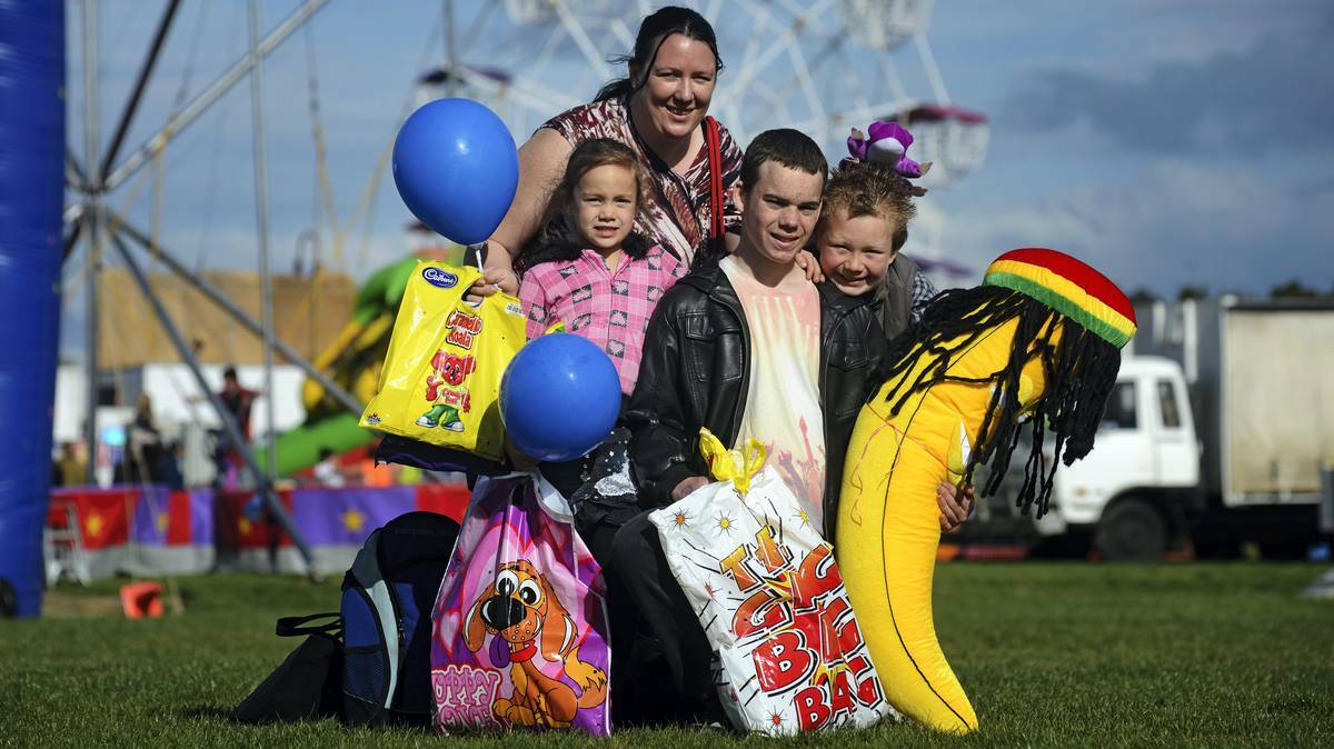 The first day of the Royal Launceston Show drew more than 10,000 patrons through the gate of the Inveresk Showgrounds. Pictured are Anita Perrott, of Trevallyn, with her family Annalissa Growden, 7, Liam O'Sullivan, 15, and Madden Growden, 9. PHOTO: Launceston Exmainer.