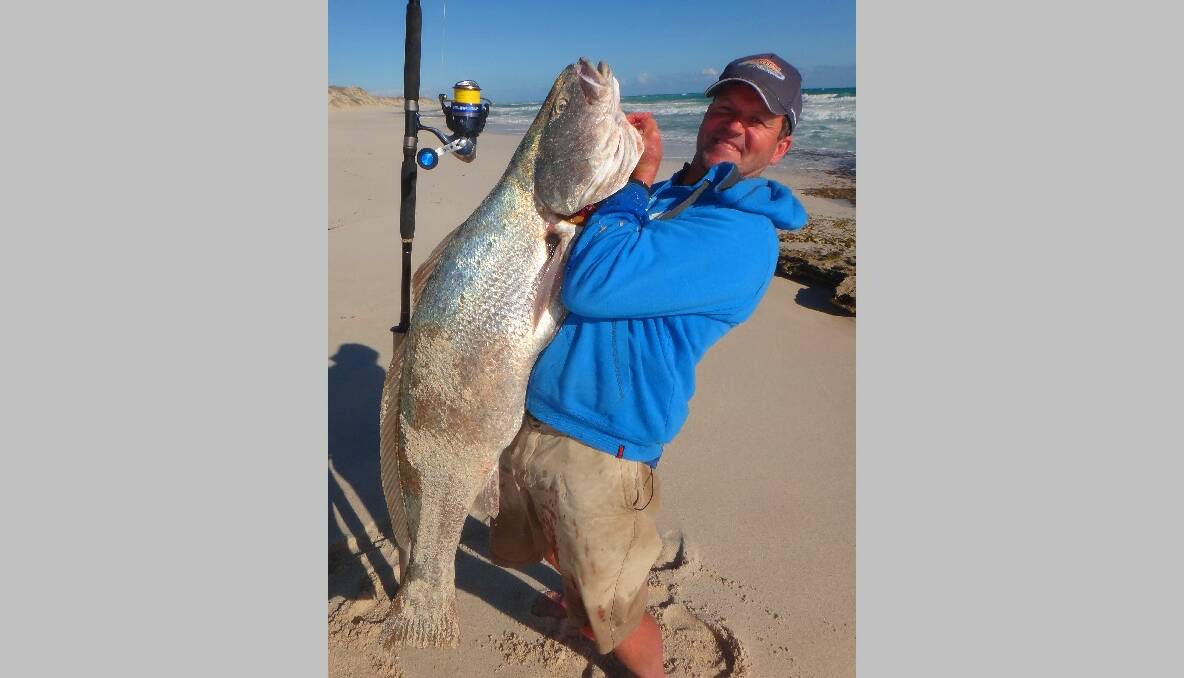BYE FOR NOW: Rob Waves “bye for now” with his recent PB jewfish caught in SA. (27/11/2013) 