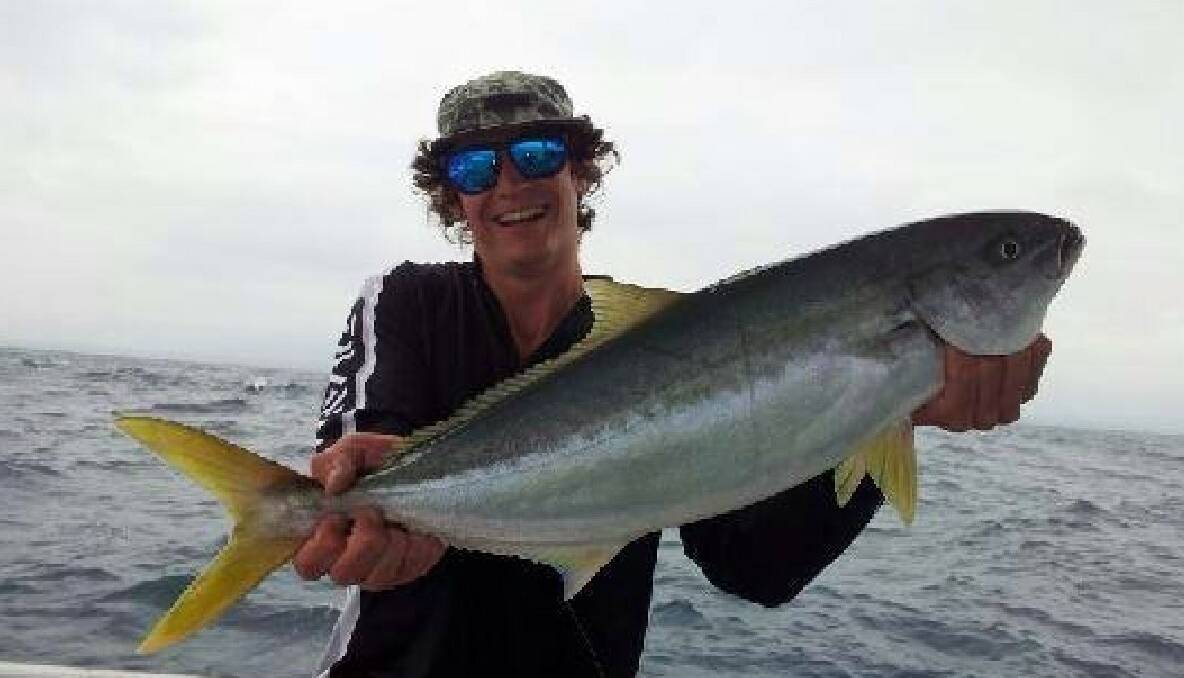 ISLAND FLATHEAD: Tim Watson on Charter Fish Narooma’s Playstation with a nice kingfish caught at Montague Island on Sunday.  (24/12/2013)