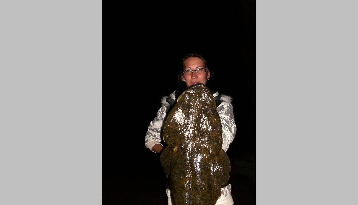 GIANT FLATHEAD: Now this is a flathead! Caught by Ashleigh Clarke in the Narooma inlet last week fishing a pink Squidgy plastic and successfully released by Adam Babidge. They didn't measure it just wanted to get it back in the water. (22/10/2013) 
