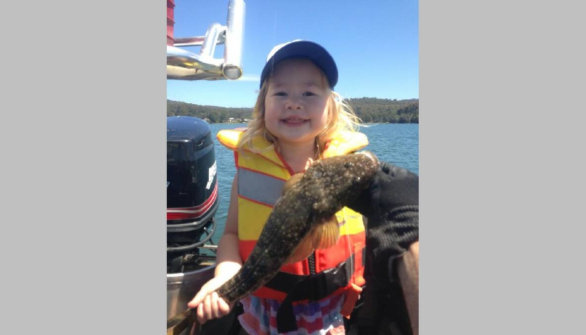 LITTLE FISHER: Olivia from Narooma caught this 45cm flathead on bait in Dalmeny Lake on Sunday despite being only age 3. She loves spending time on the boat with dad. (6/11/2013) 