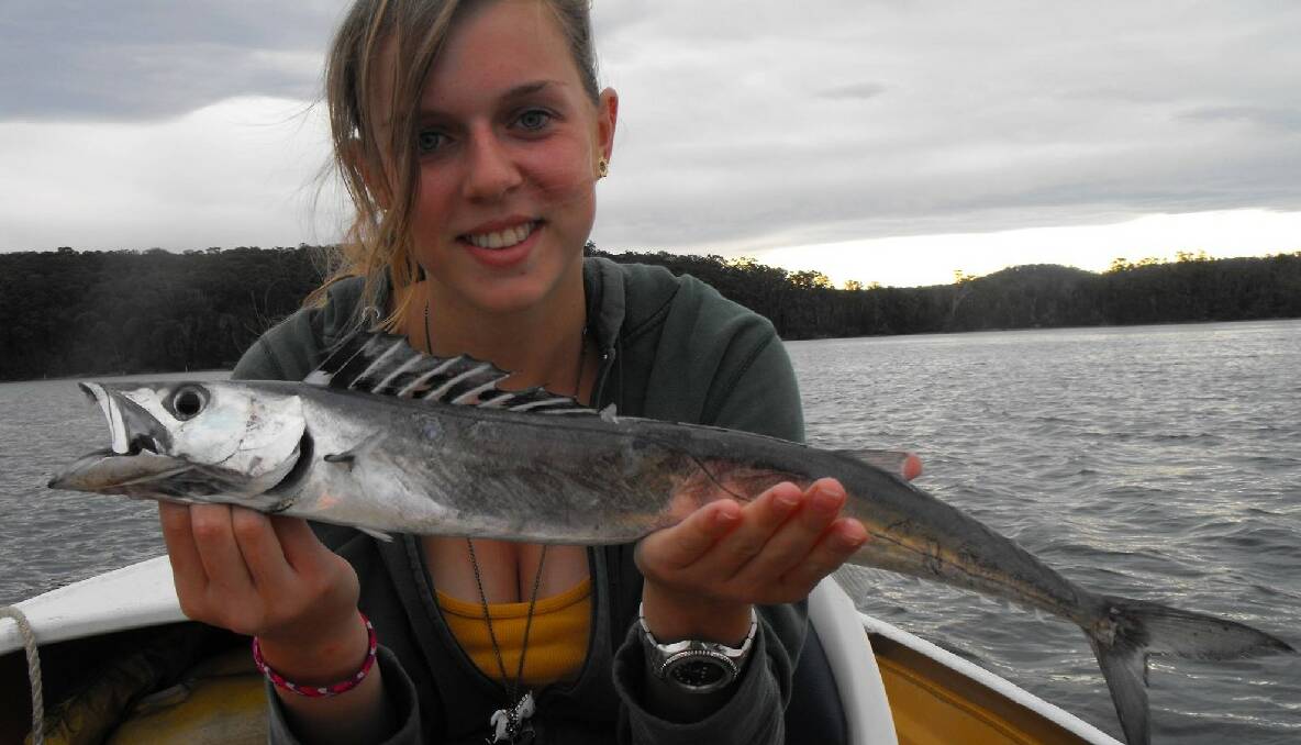 COUTA: German backpacker Linda with one of several barracouta caught at Narooma. (24/10/2013) 