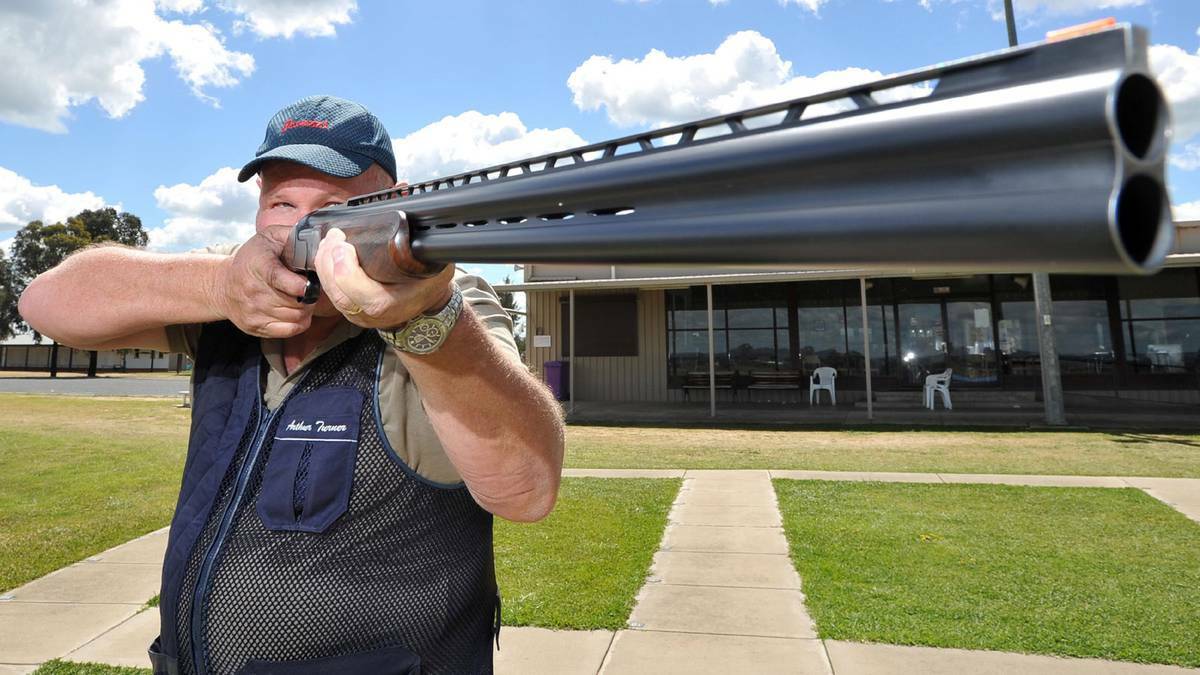 DAILY ADVERTISER: Wagga marksman Arthur Turner takes aim with his shotgun at the National Shooting Ground in Wagga yesterday. Picture: Michael Frogley 