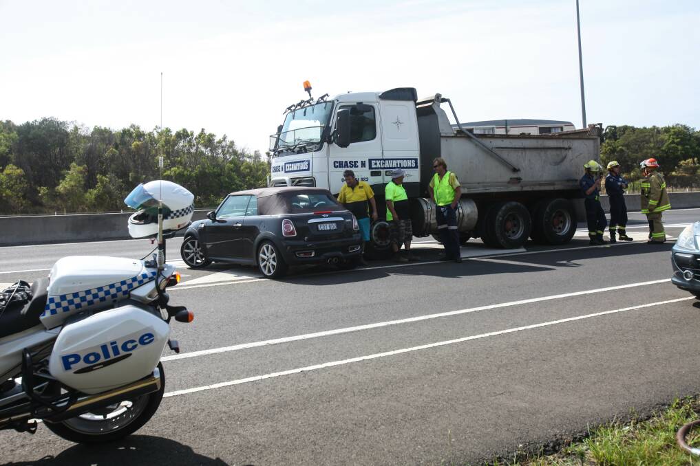 A truck and a convertible Mini Cooper collided near the Bombo interchange on Thursday. Picture: DANIELLE CETINSKI