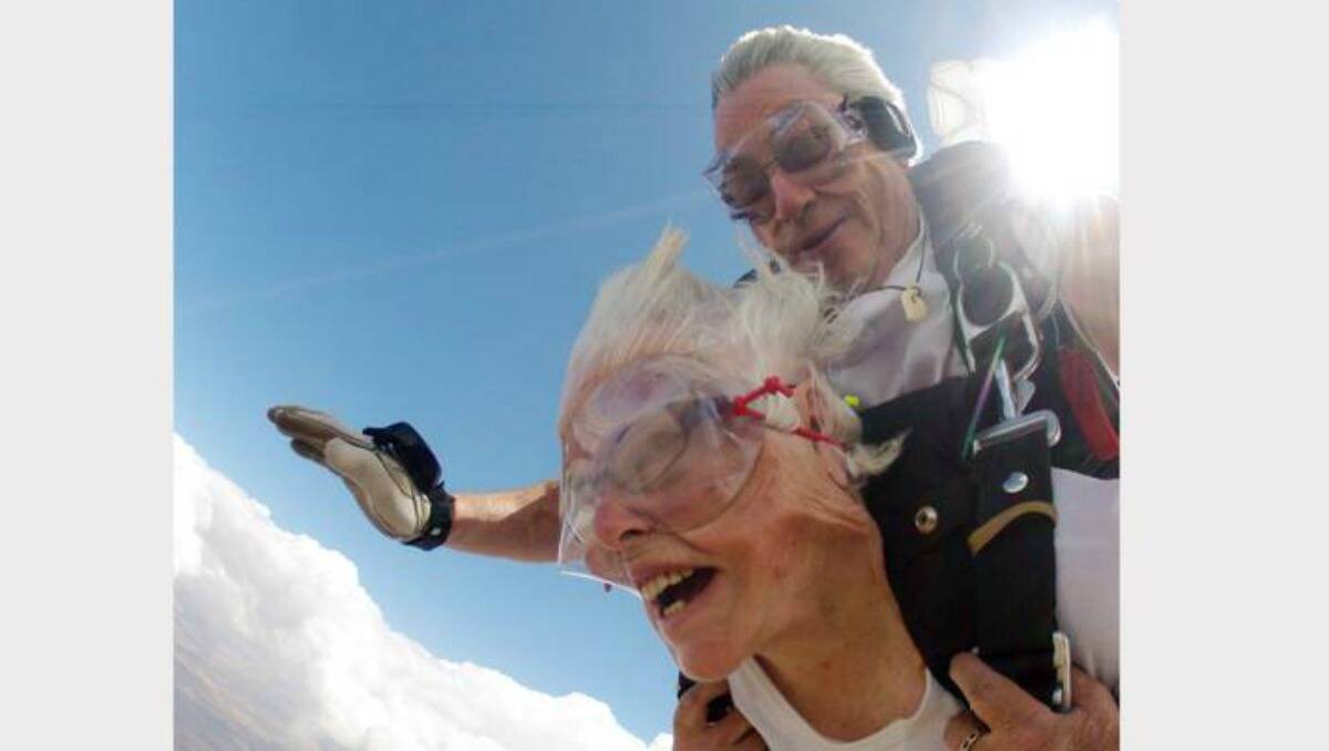 COROWA: Paulette Maury, 85, and Craig Bennett in a tandem skydive at the Corowa. Picture: SUPPLIED